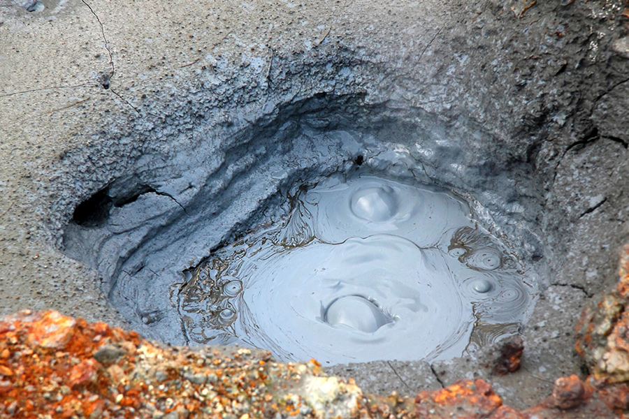 Mudpots above the river in the valley